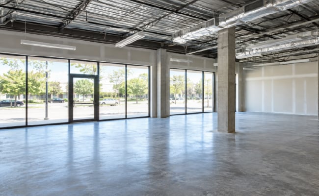 Vacant ground-floor commercial space with storefront windows